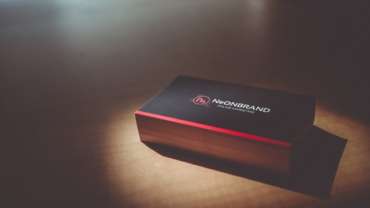 Choosing Between Coated and Uncoated Business Cards in Kansas City